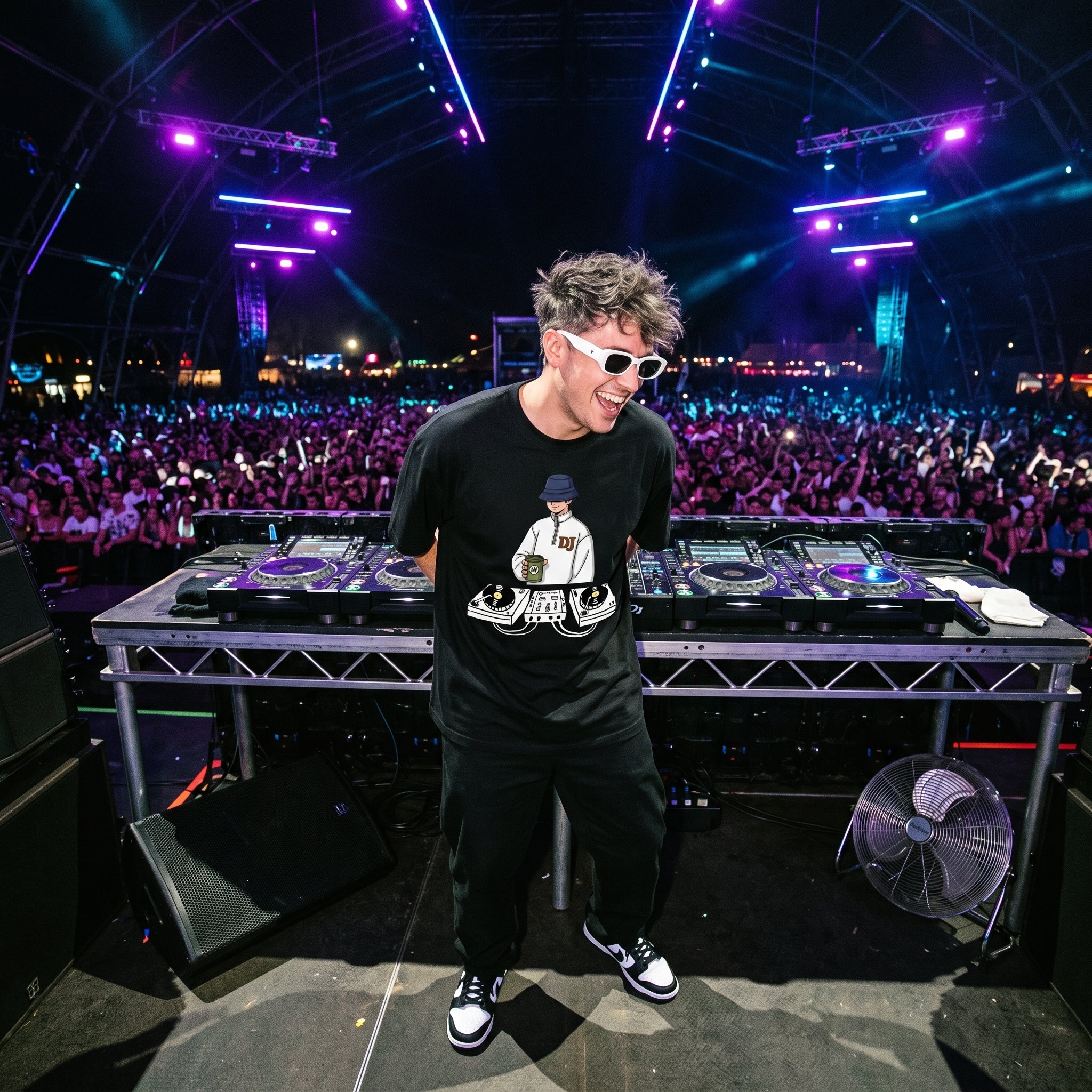 DJ in Chill Session DJ graphic oversized t-shirt performing on outdoor festival stage in front of large crowd