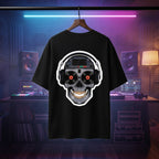 Cyberpunk skull graphic on an oversized black DJ tee, neon-lit studio background.