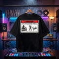 "Danger: DJ In Action" high-energy print on an oversized black rave t-shirt.