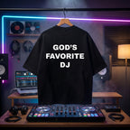 "God's Favorite DJ" confident quote print on a black oversized streetwear tee.