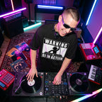 Male DJ in Warning DJ In Action Black Oversized T-Shirt live studio session top angle