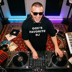 Male DJ wearing God's Favorite DJ Quote Oversized T-Shirt live studio session top angle