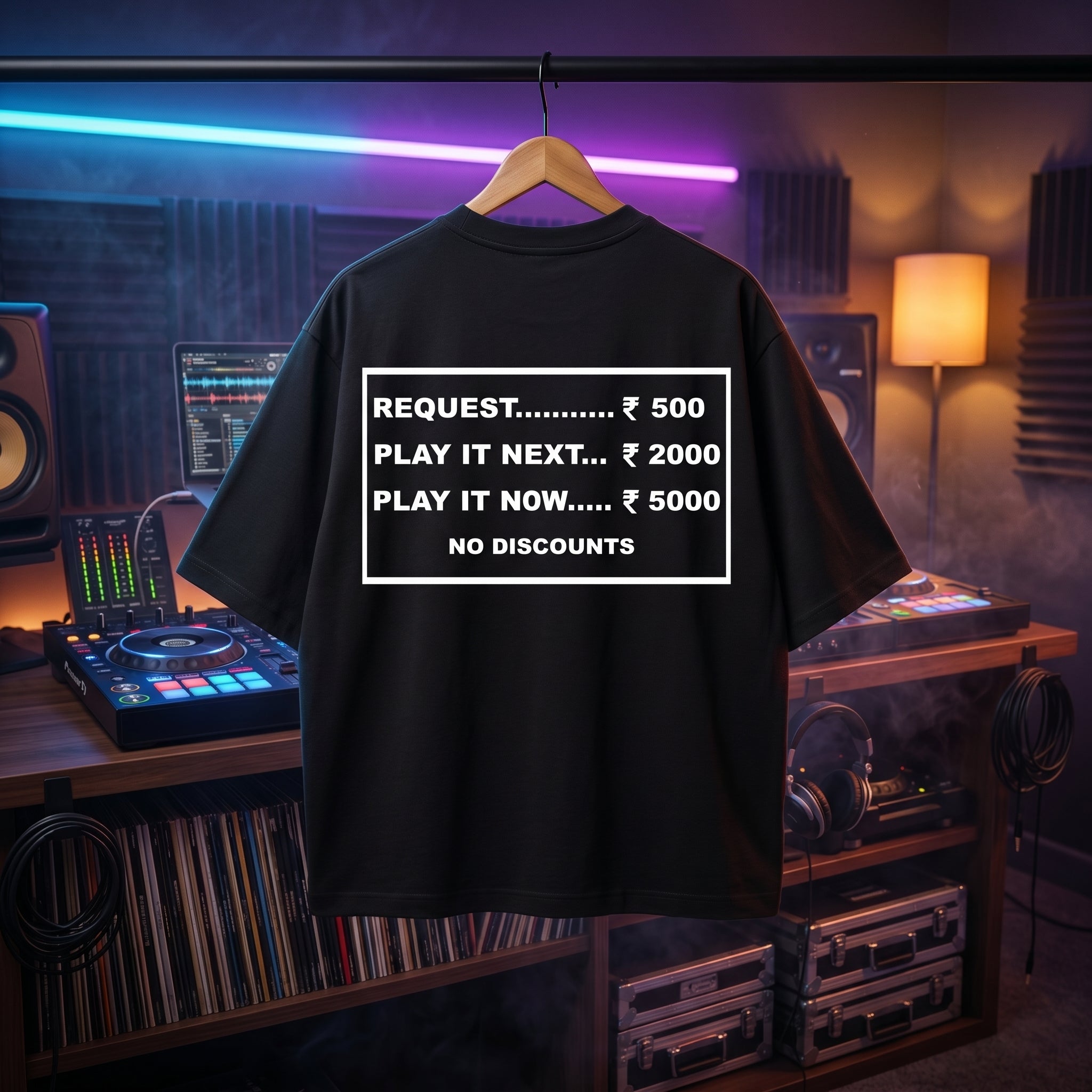 Oversized black t-shirt with funny "Request Rate Card" DJ quote print.