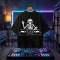 Skeleton DJ graphic printed on a heavyweight black oversized t-shirt.