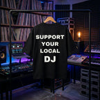 "Support Your Local DJ" quote print on an oversized black community tee.