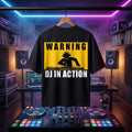 Bold "Warning: DJ In Action" print on an oversized black club t-shirt.