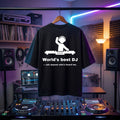 Black oversized DJ t-shirt with "World's Best DJ" quote print, worn on a hanger in a DJ studio setup.