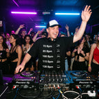 Male DJ in BPM Chart Oversized T-Shirt performing in club