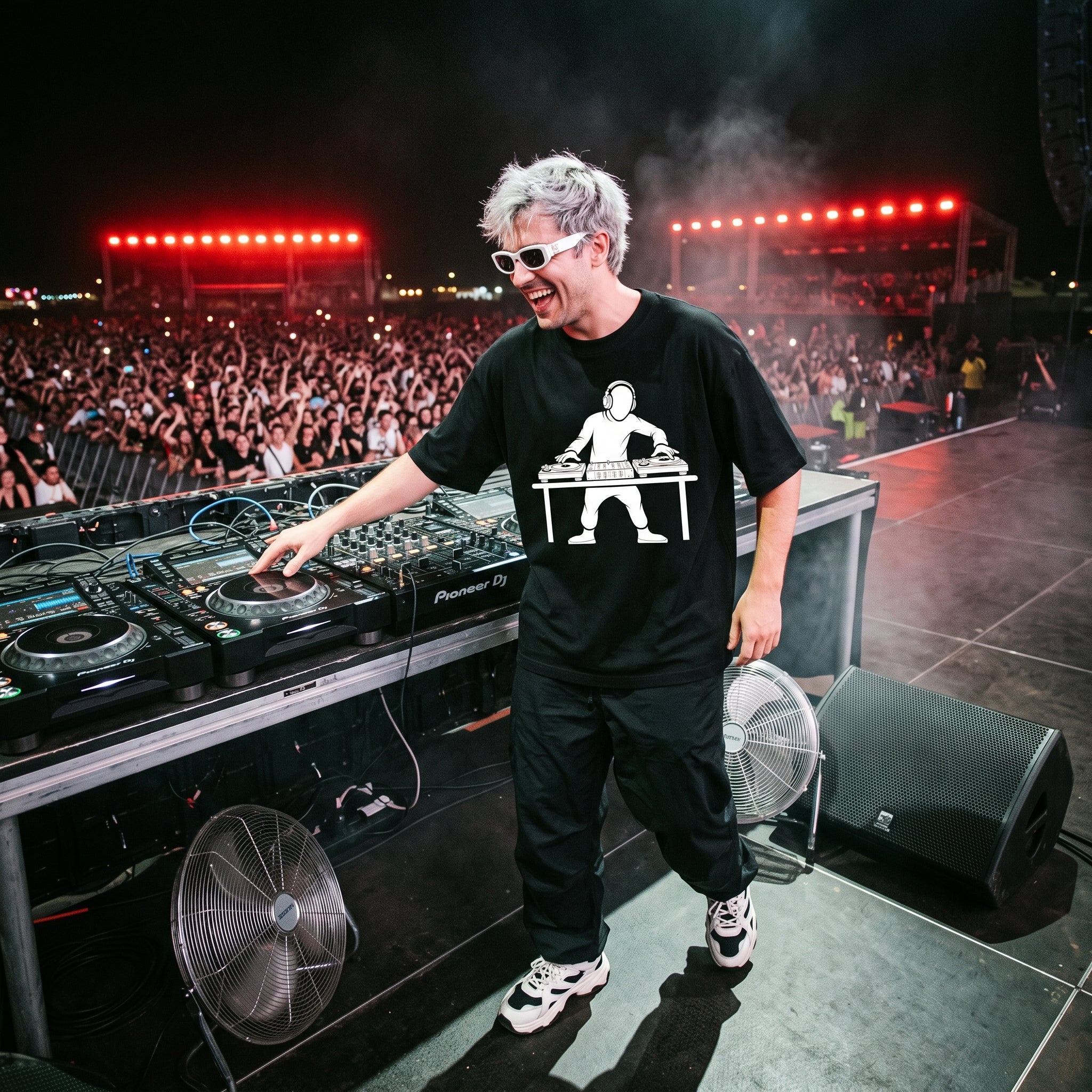 DJ in DJ Turntable Graphic Black Oversized T-Shirt on festival stage massive crowd