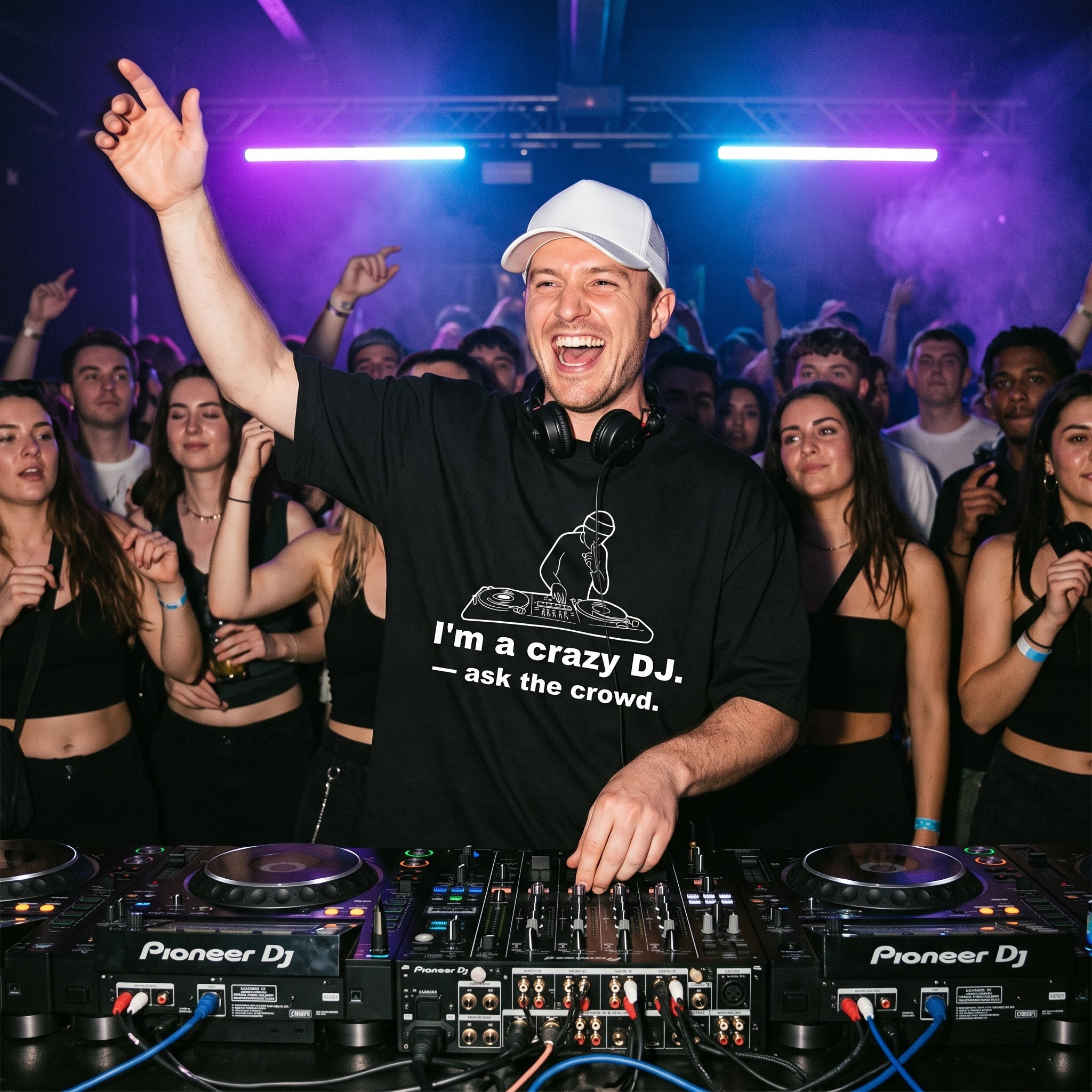 DJ wearing I'm A Crazy DJ Quote Oversized T-Shirt performing in club hand raised white cap