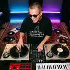 DJ wearing I'm A Crazy DJ Quote Oversized T-Shirt live studio session turntables top angle